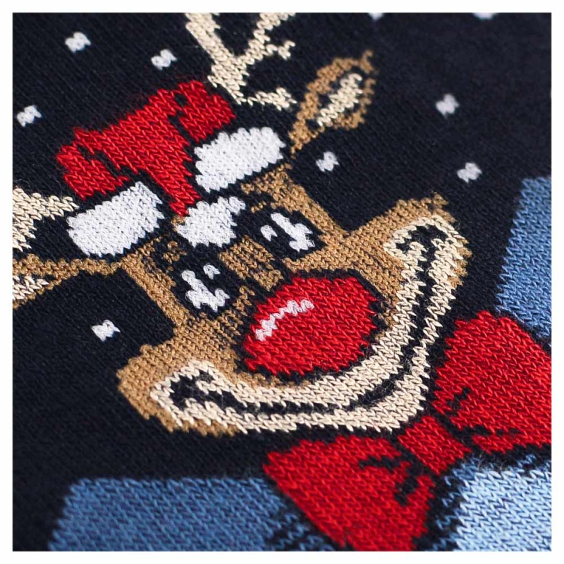 Detal materiału skarpet Cornette z reniferem.