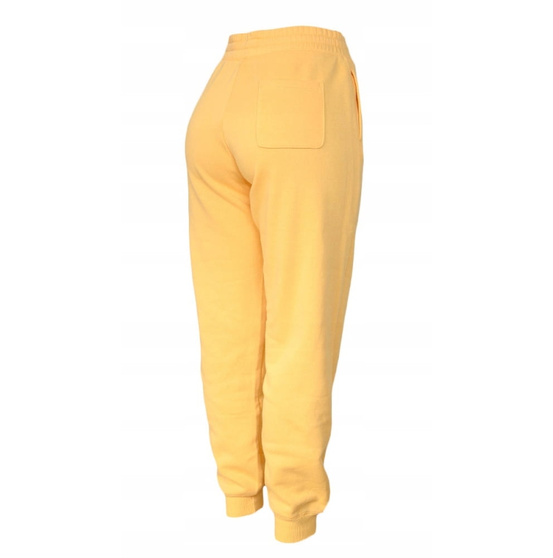 Spodnie dresowe Champion 115411 Ciemny żółty z tyłu