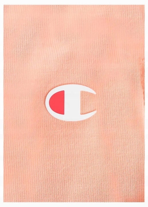 Logo Champion na brzoskwiniowych spodenkach damskich