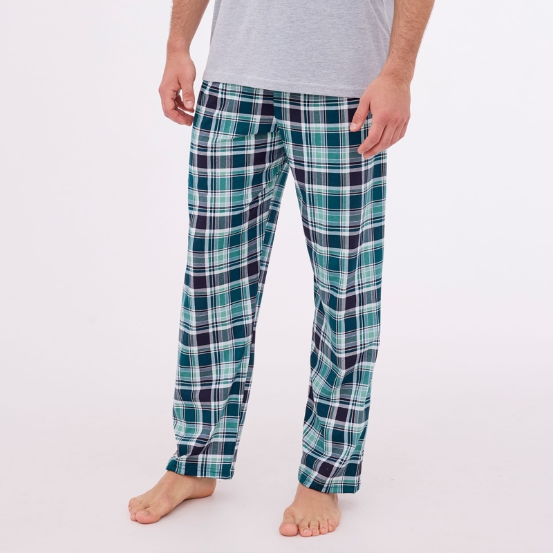 Długie spodnie w zielono-niebieską kratę z piżamy męskiej Cornette.