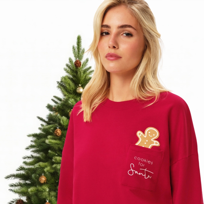 Dwuczęściowy komplet Henderson w świątecznym stylu, składający się z czerwonej bluzy i szortów.