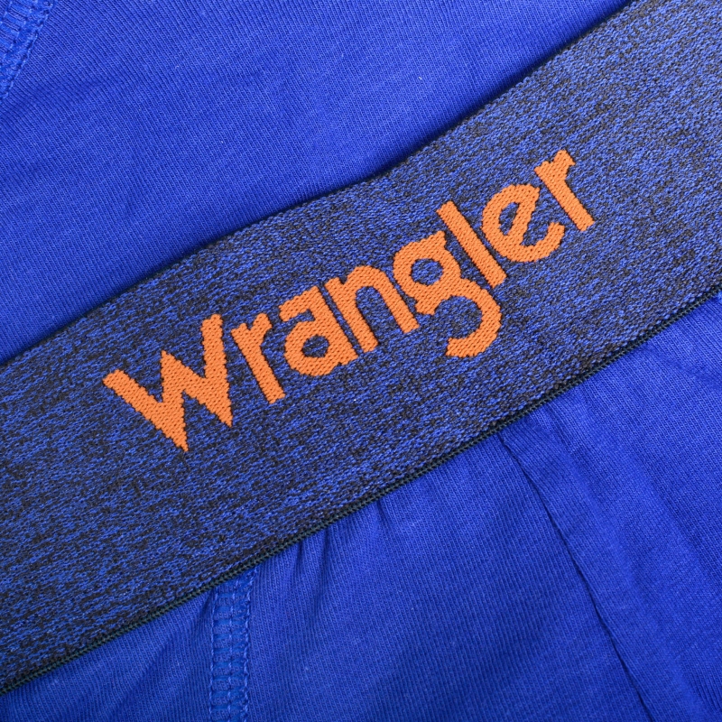 Zbliżenie na gumę bokserek Wrangler z pomarańczowym logo
