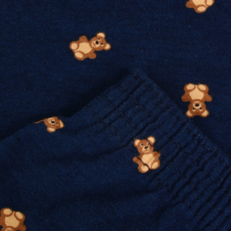 Granatowe spodnie piżamowe z elastyczną gumką i wzorem małych brązowych misiów.