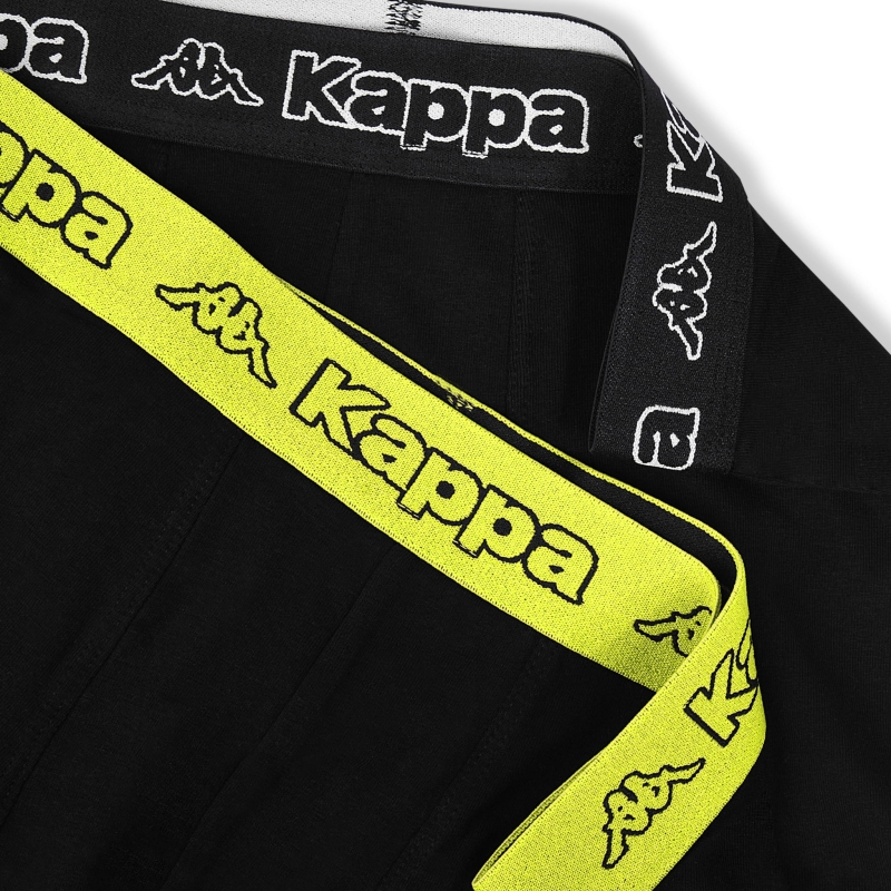 Zbliżenie na żółtą gumę z logo Kappa umieszczoną w pasie