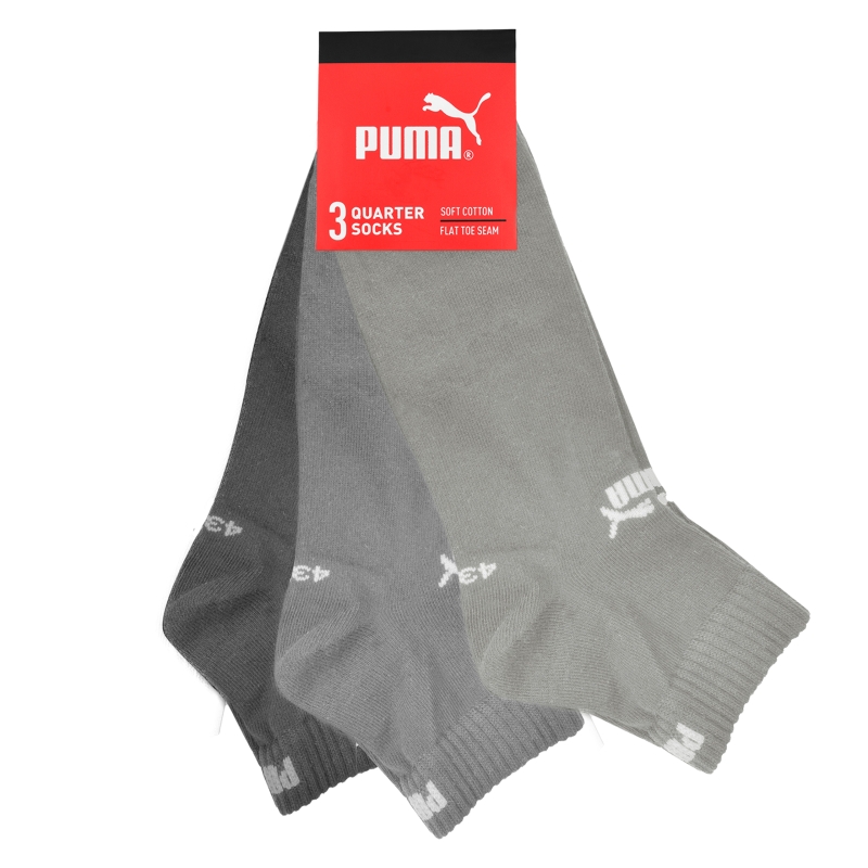 Komplet trzech par skarpet Puma typu quarter w różnych odcieniach szarości.