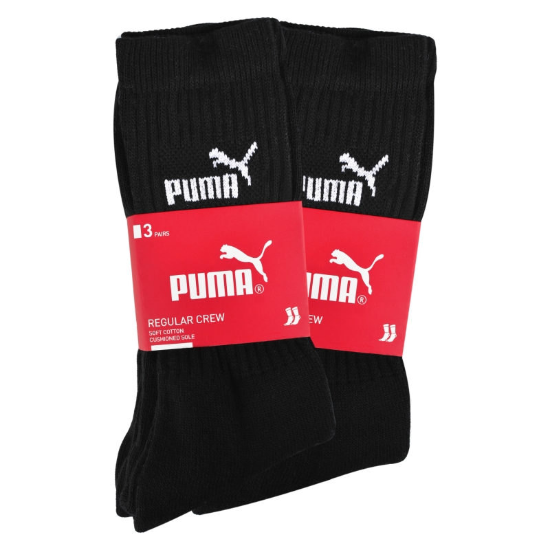 Sześć par czarnych skarpet Puma zapakowanych w dwa zestawy po trzy pary.