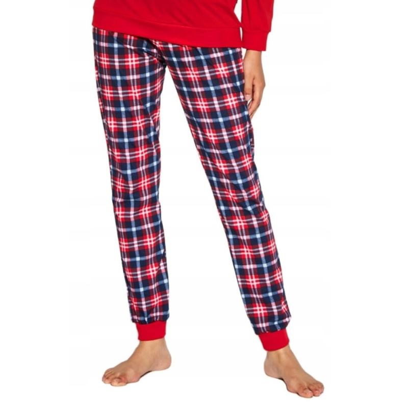 Damskie spodnie piżamowe Cornette w czerwoną i granatową kratę, zakończone czerwonym ściągaczem.