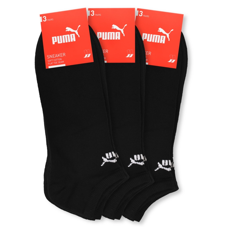 Trzy opakowania czarnych stopek PUMA, każde oznaczone jako zestaw trzech par